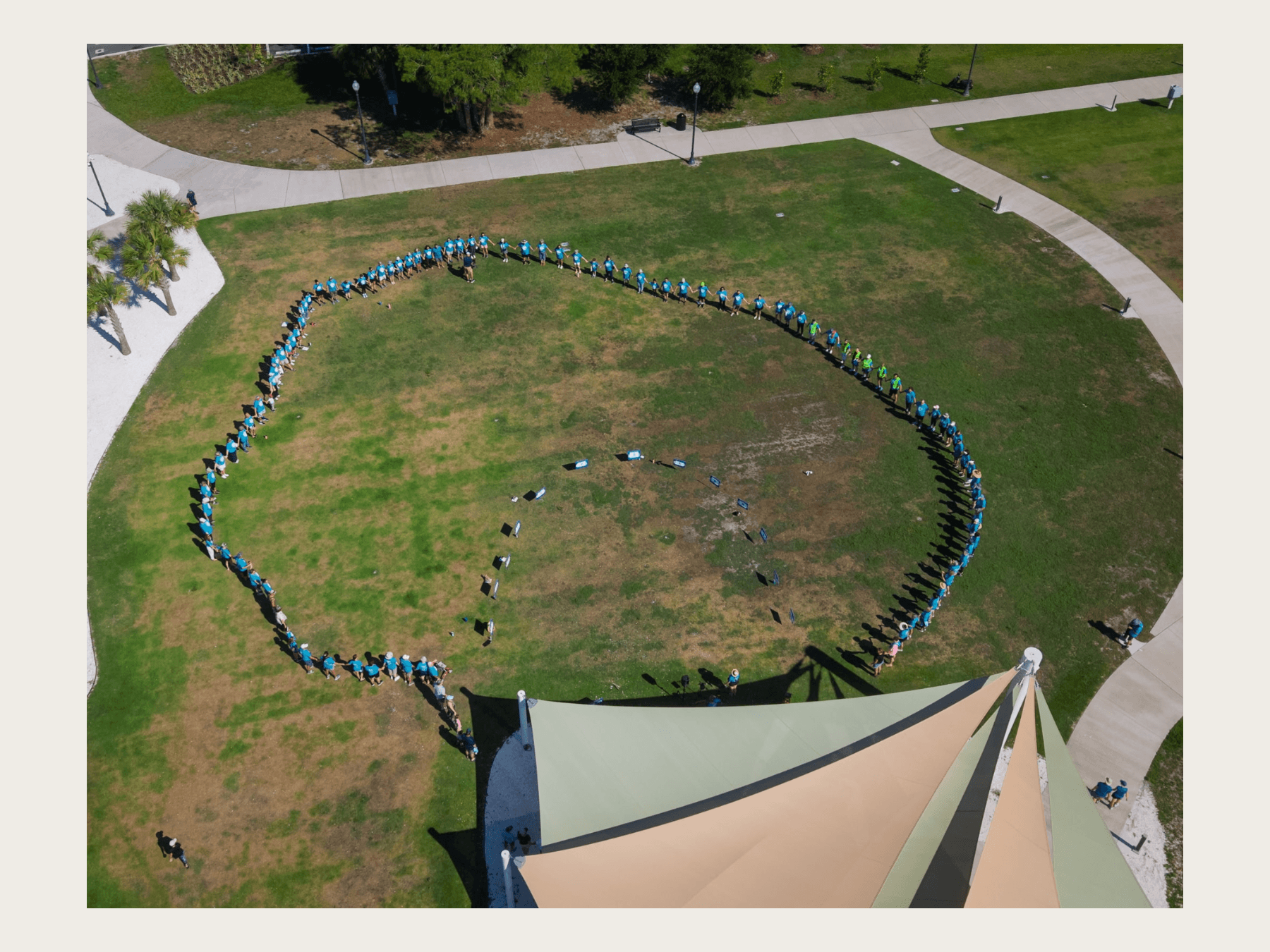 Drone shot of local event gathering for Hands Across the Harbor in Safety Harbor, FL